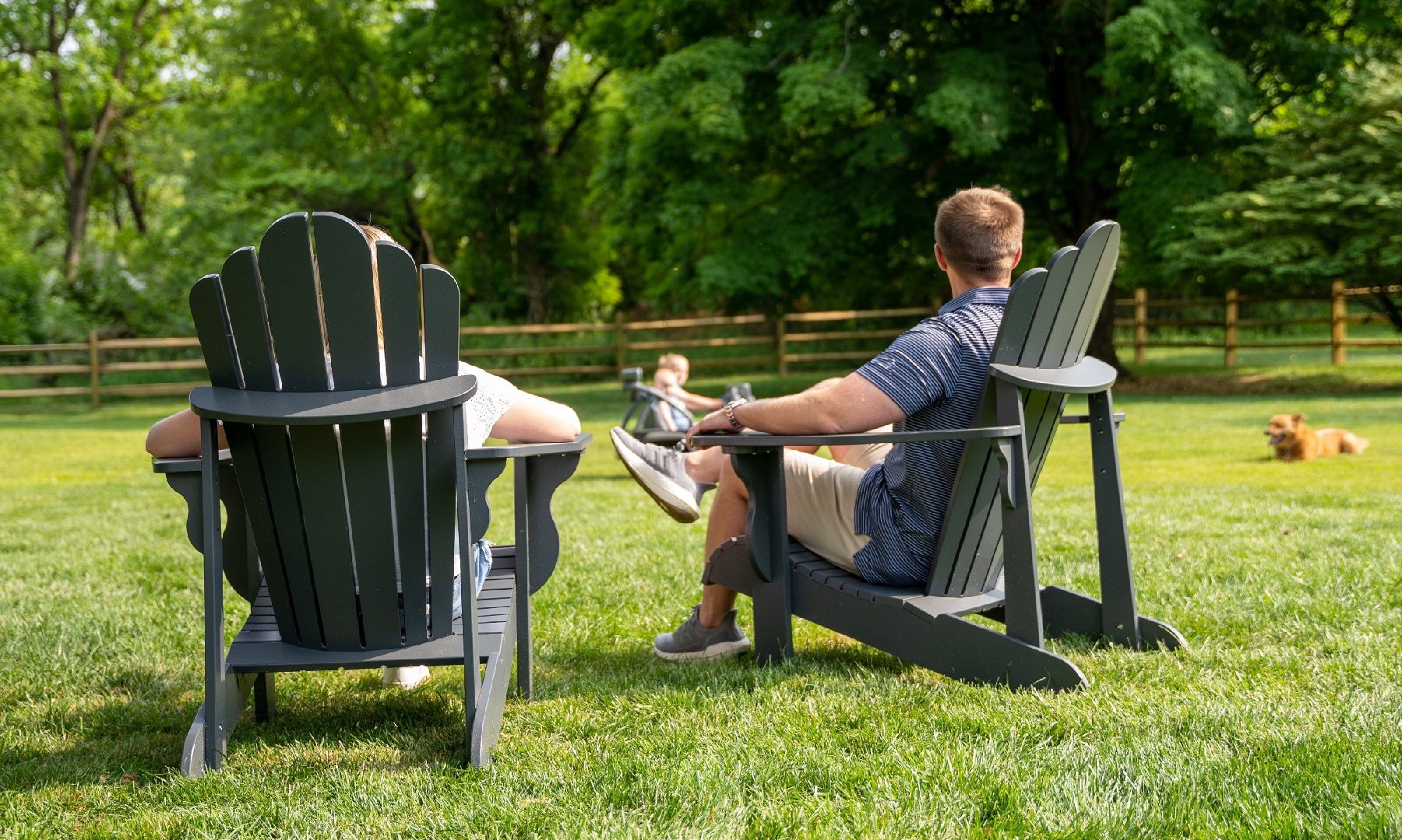 couple relaxing outside in their lawn